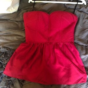 Red strapless peplum top